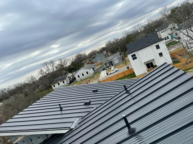 Standing seam metal roof panels with vents for Skylight Repair in Richland